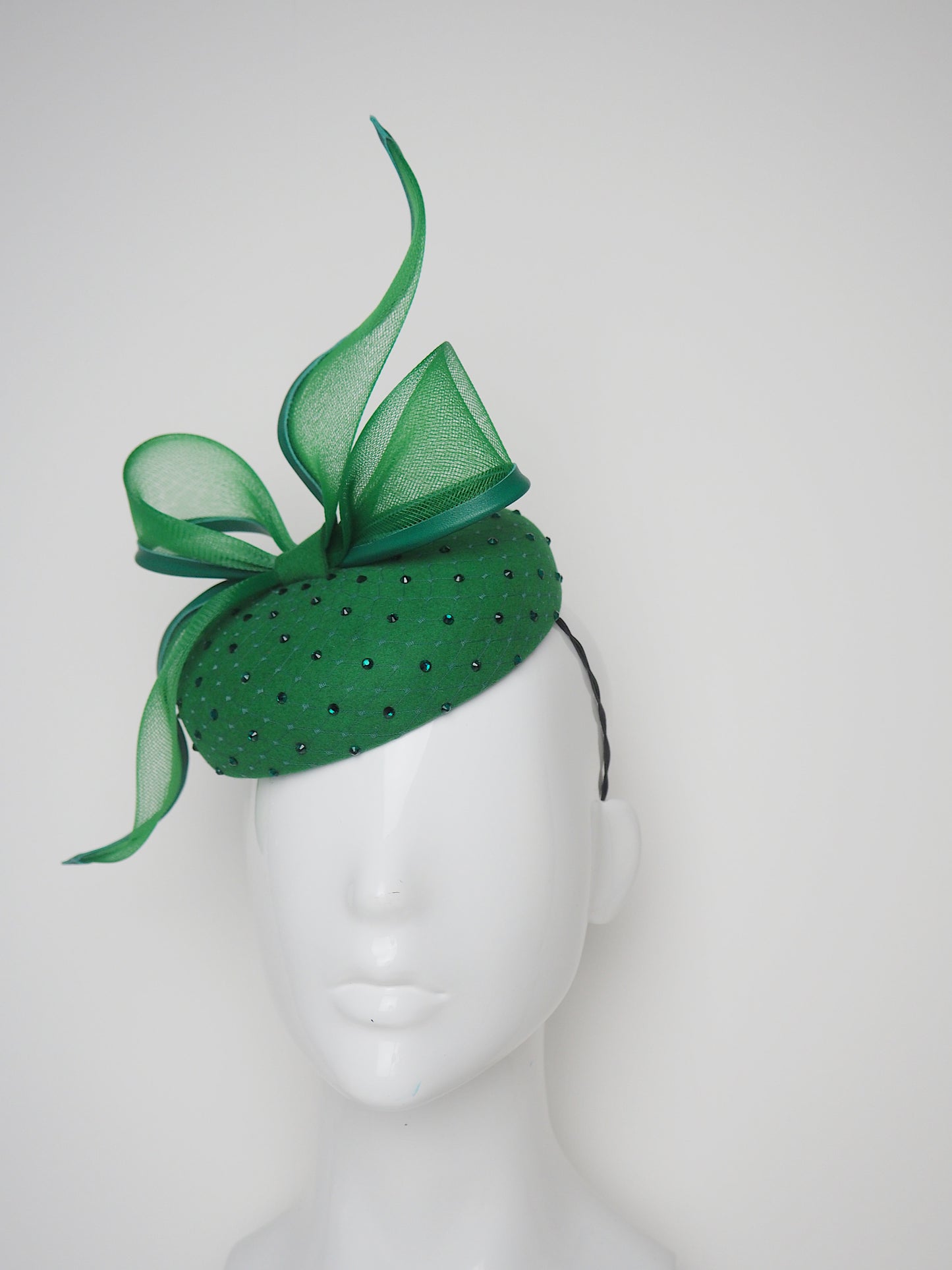 Emerald Envy - Emerald fine Fur felt button with crinoline bow and diamante veil detail.