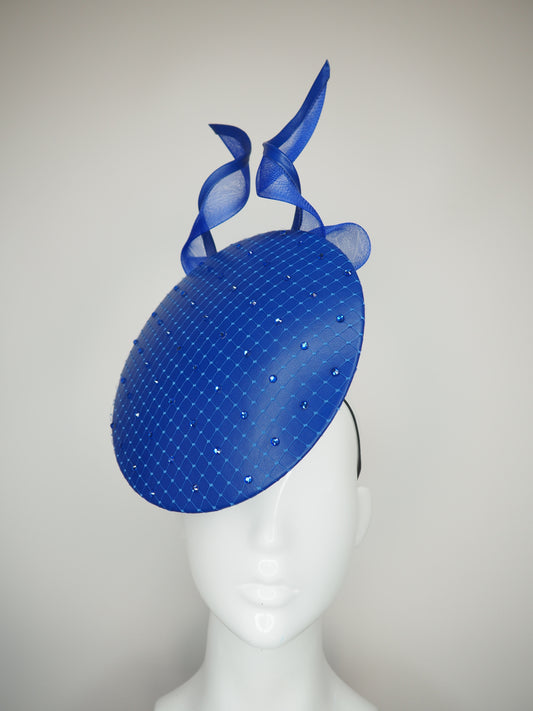 Sapphire Shimmer - Blue floating disc with leather bound crinoline bow and crystal embellsihed veil