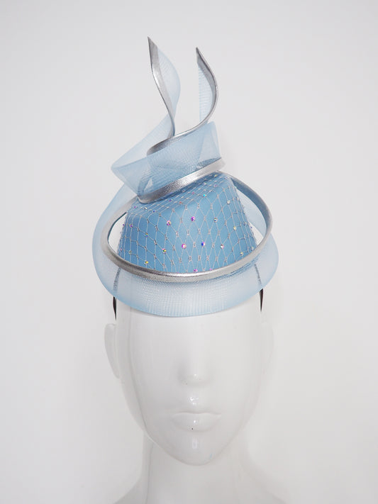 Frozen in time - Blue asymetrical leather base with silver veil and iridescent crystals and a crinoline swirl