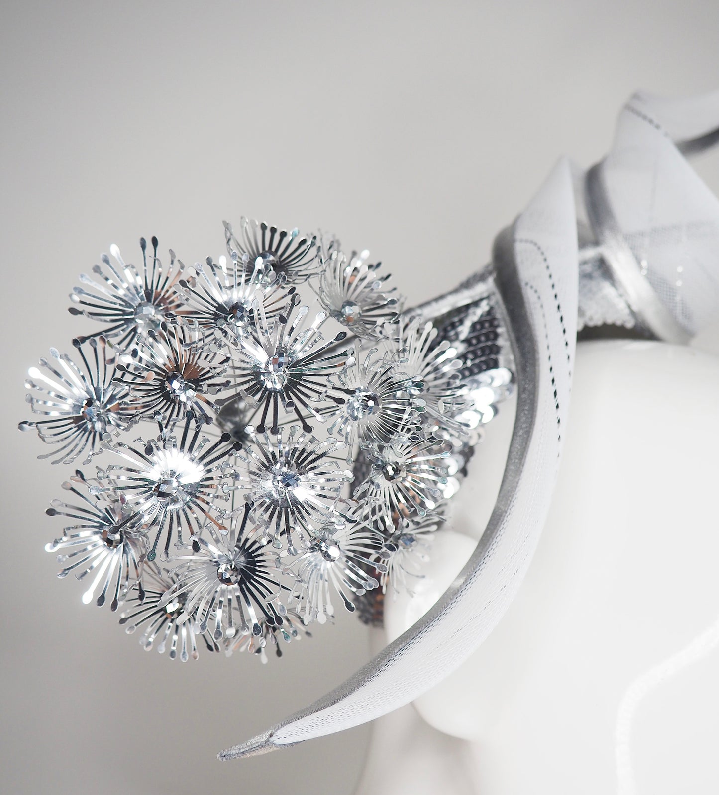 *reduced worn once - Disco Dandelion - -Silver sequinned 3d Headband with a silver dandelion and crinoline swirl