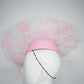 La Vie En Rose - Transparent Crystoform floral patterned brim on a pastel pink leather teardrop base.