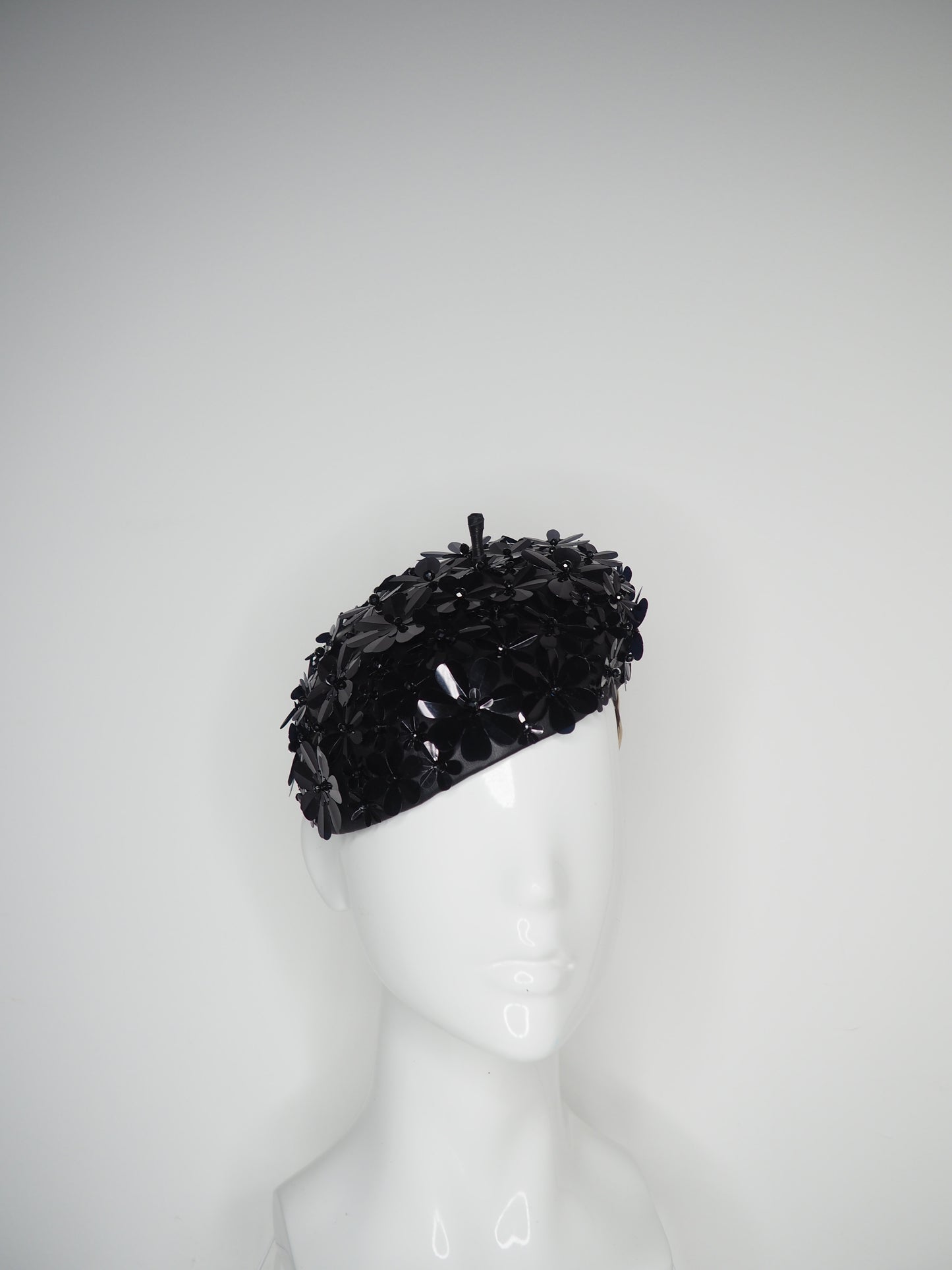 Blossom - Black beaded Sequin flower on black leather face hugger beret