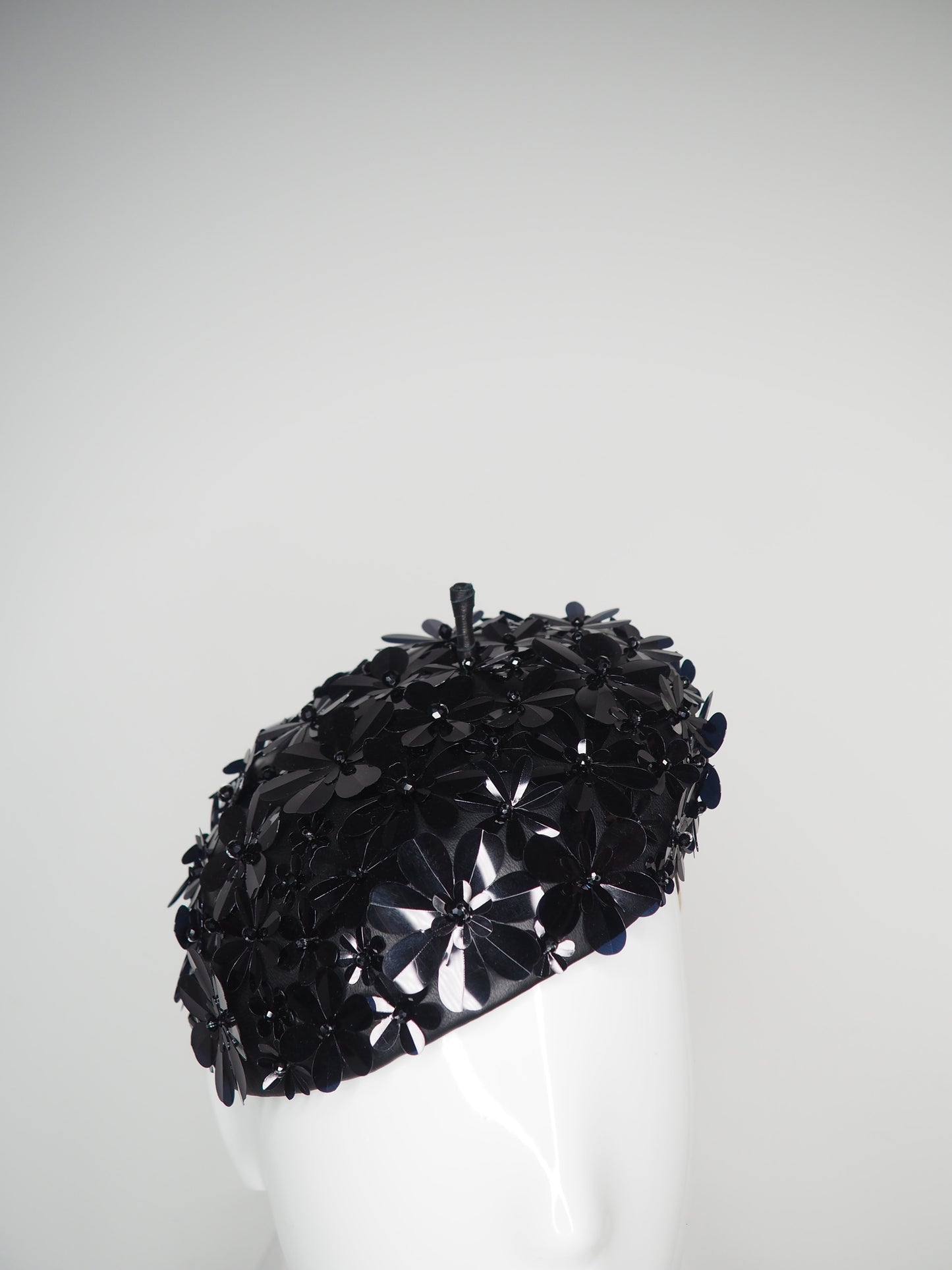 Blossom - Black beaded Sequin flower on black leather face hugger beret