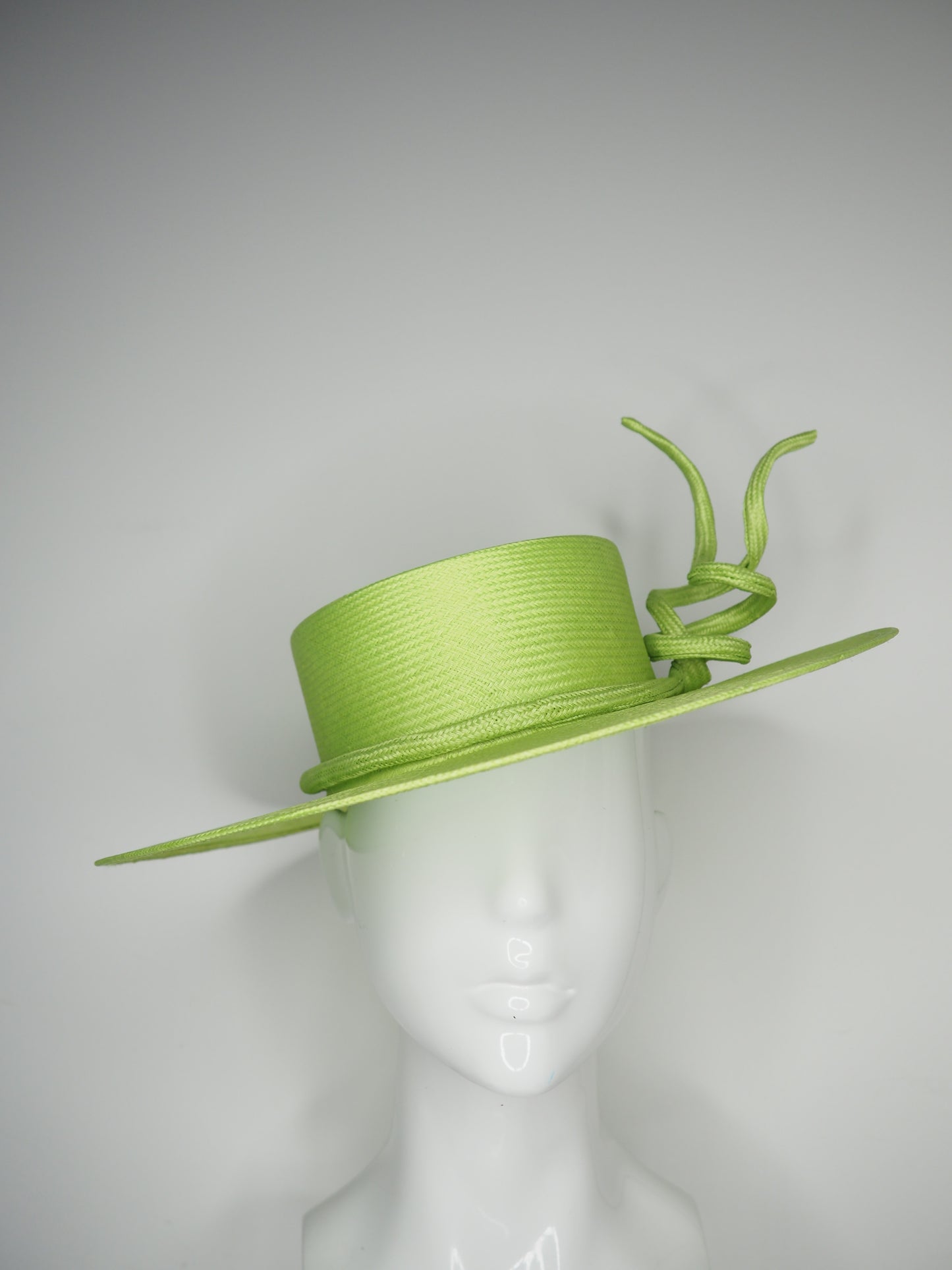 Lime Twist - Hand Dyed lime green straw boater with a sculpted wired parissisal rope knot.