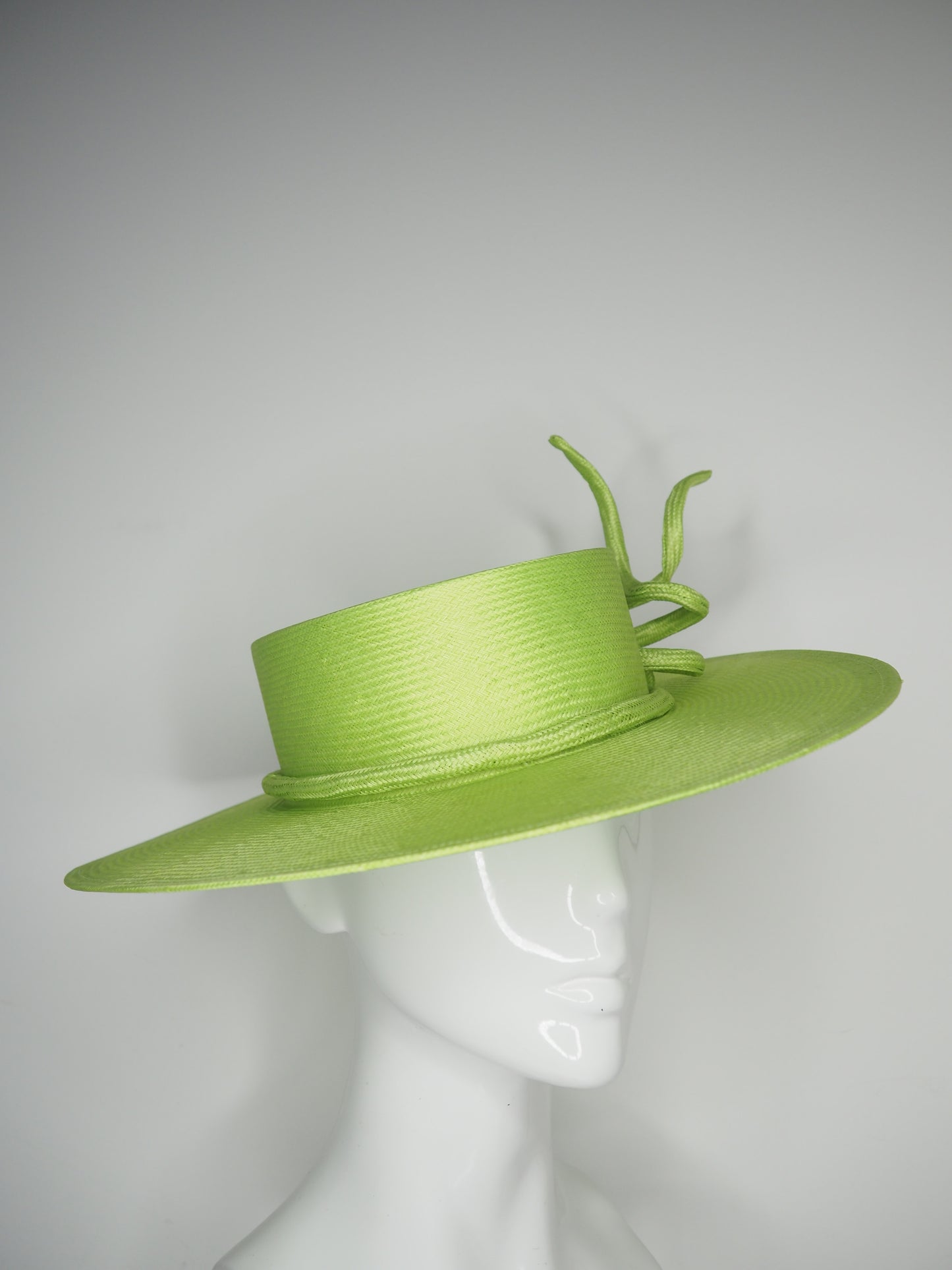 Lime Twist - Hand Dyed lime green straw boater with a sculpted wired parissisal rope knot.