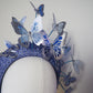 *reduced. Worn once Flutter and fly - Crystoform butterflies in shades of blue with silver detail on a 3d vintage straw headband.