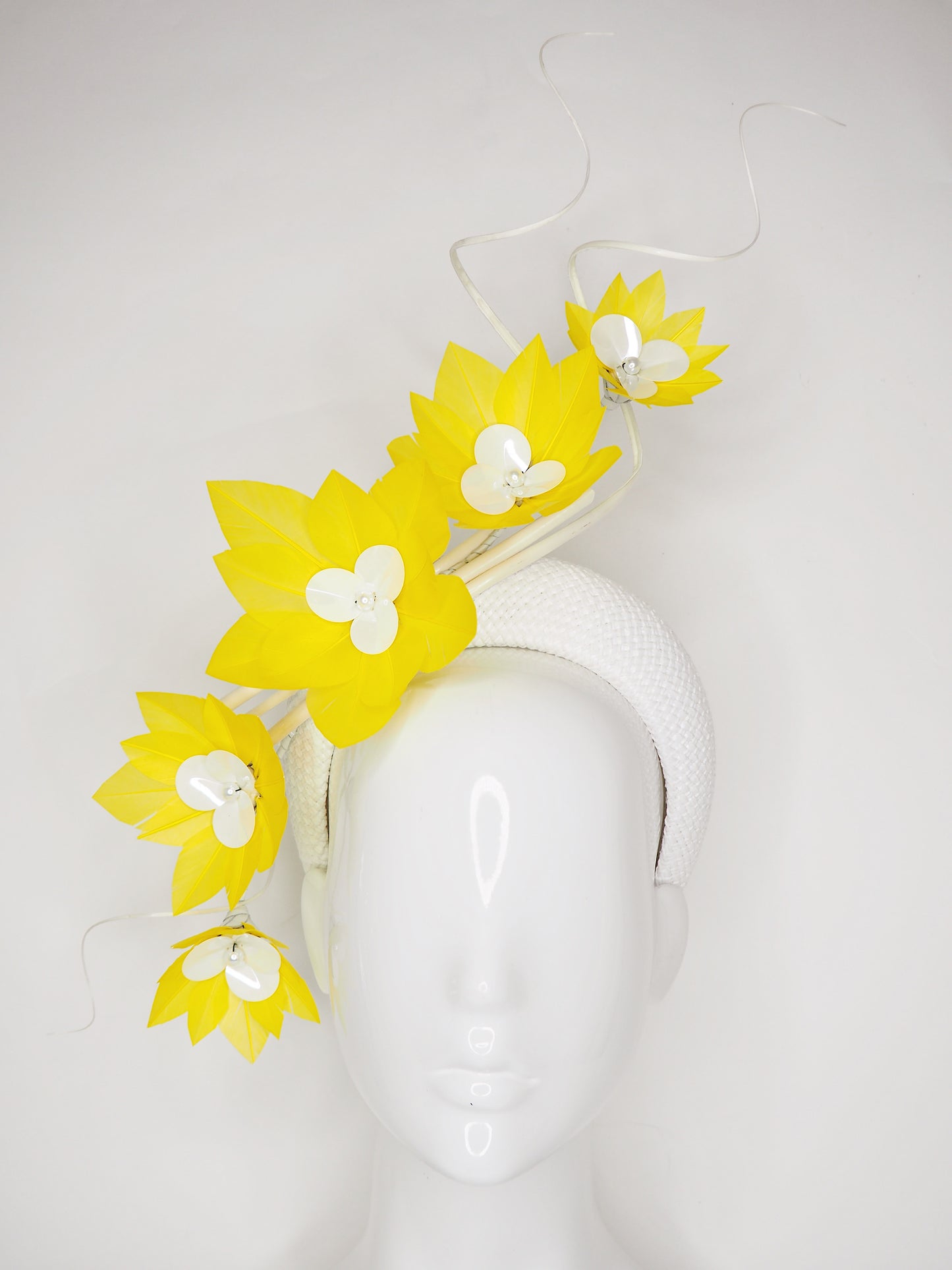 Pre-loved - You Are My Sunshine -Yellow Feather flower vine with ostrich quills on a white woven 3d headband