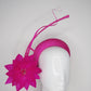 Flower burst - Hot Pink Tinalak straw base with sculpted quills and fleather starburst.